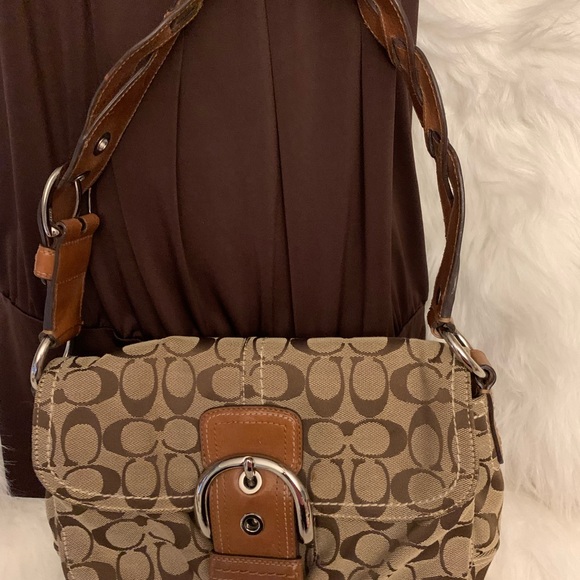 Coach Handbags - Coach Shoulder Bag. No rips tears lots of pockets.